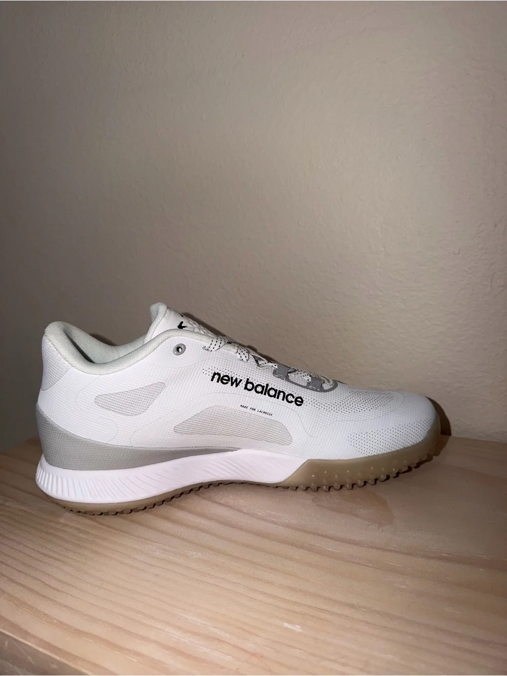 New Balance Men’s White Athletic Shoes with Black Accents